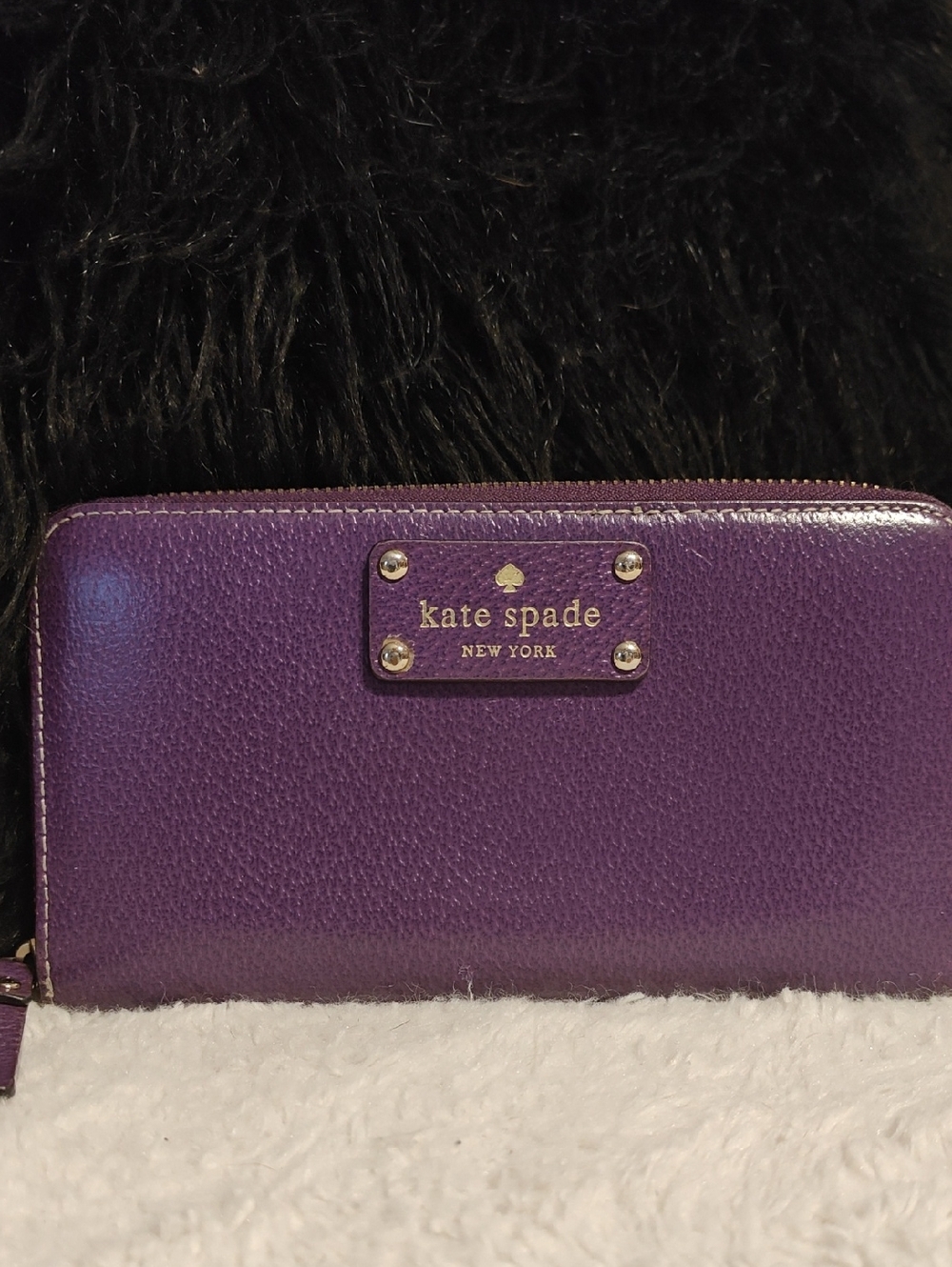 Kate Spade purple zip-around wallet